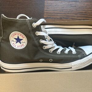 Olive green high top Chuck Taylor converse color is called grape leaf